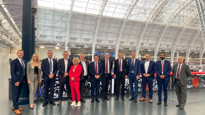 Paul Howe Venture Security MD with the S12 members and Minister